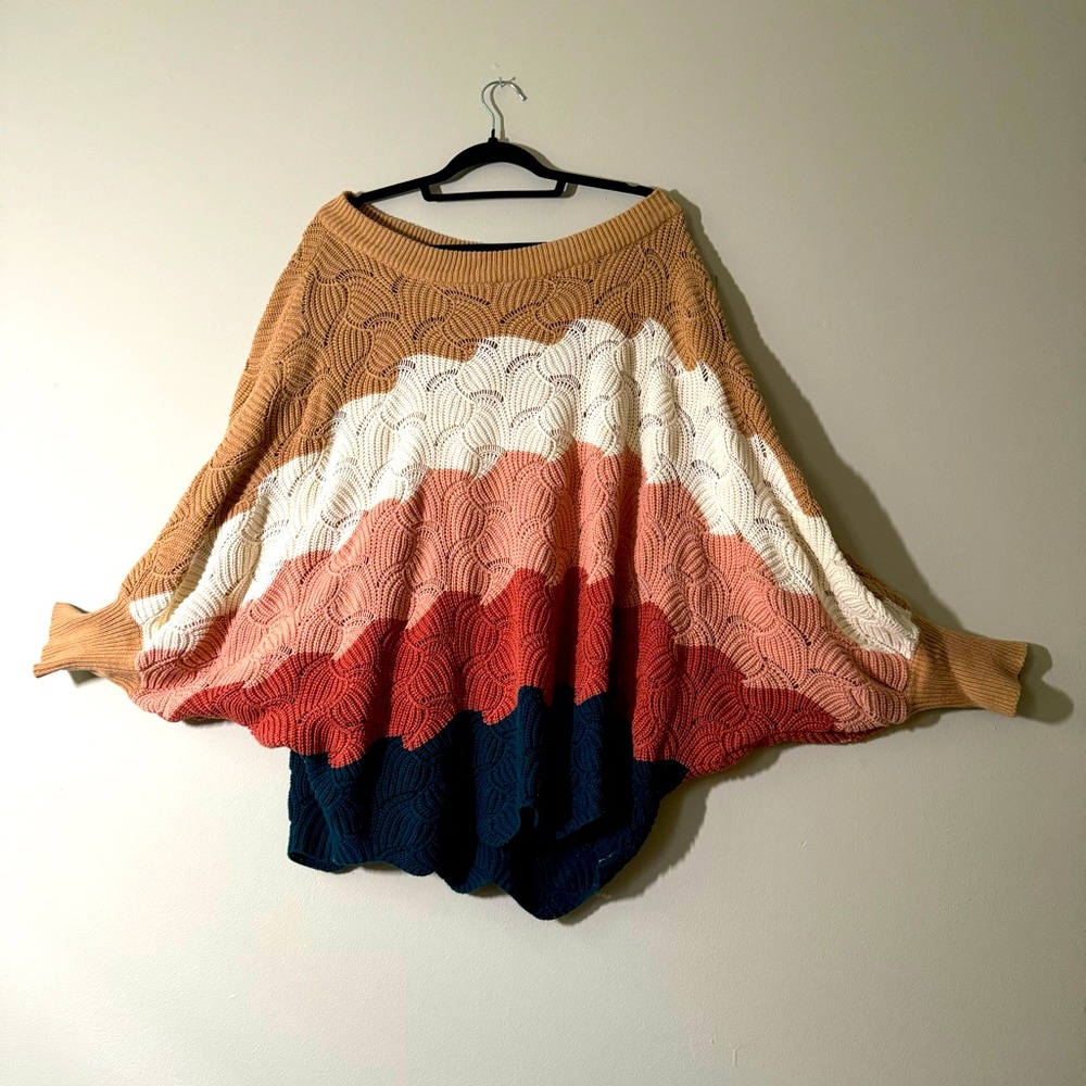 Scalloped oversized knit sweater with dropped sleeves